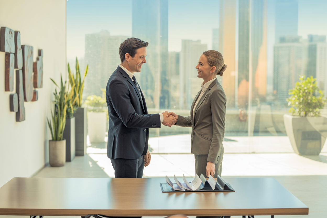 Business consultant greeting foreign investor in Brazil Work Visa office