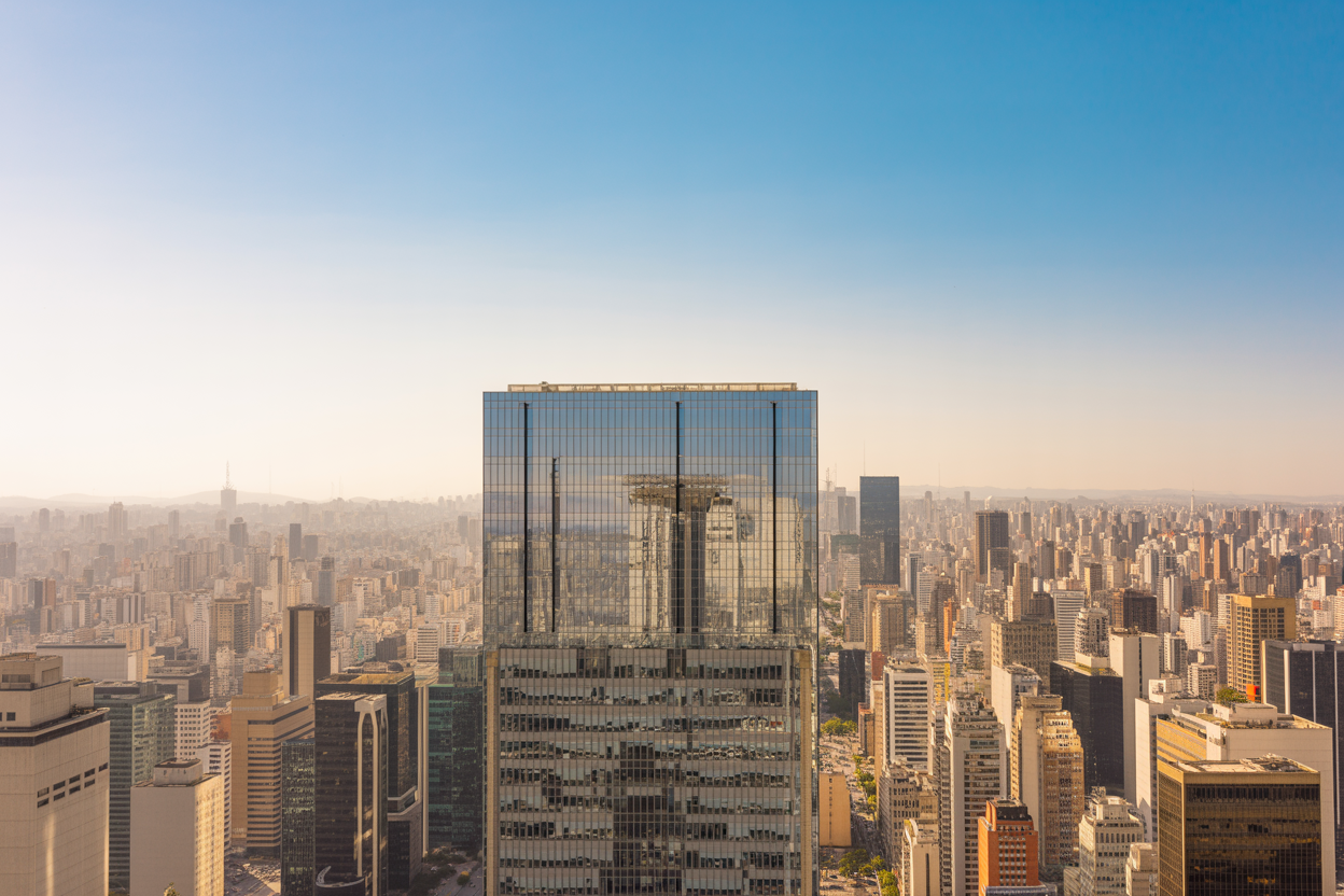 São Paulo skyline behind professional work visa advisory headquarters